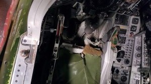 Straight down on seat and cockpit