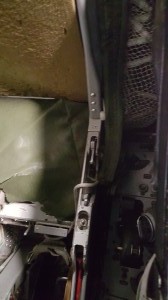 Left side of seat (from sitting in the seat)