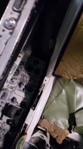 Right side of seat (from sitting in the seat)